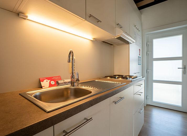 Enjoy the sunny balcony of Apartment Zeewind II A 11 in Bredene, Belgian coast, overlooking the peaceful surroundings.