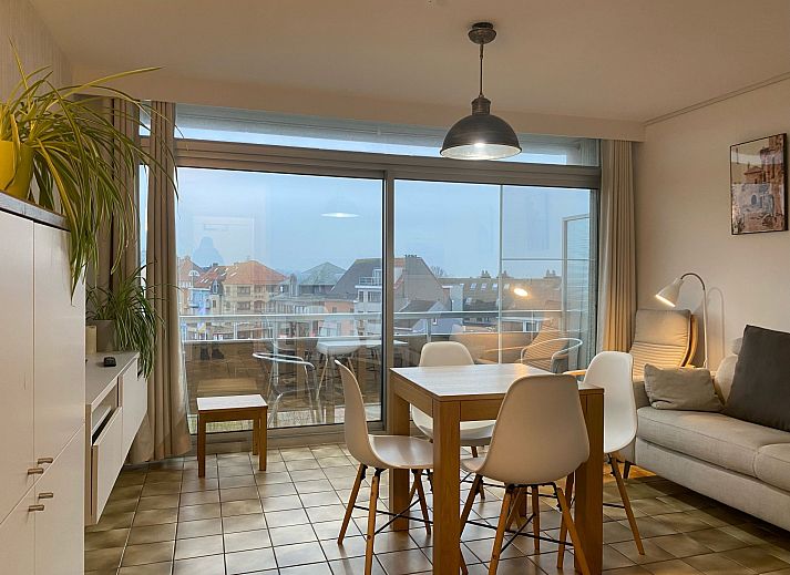 Modern interior space of Apartment Ochtendstemming in Bredene, Belgian coast, with stylish kitchen and comfortable sleeping area.