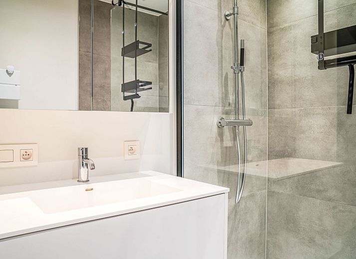 Attractive bedroom in Apartment Astrid 68, Bredene, Belgian coast, with elegantly folded towels on the bed.