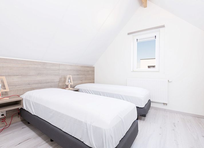 Moderne vrijstaande woning in Bredene aan de Belgische kust, omgeven door duinen en natuur, ideaal vakantiehuis voor rustzoekers.