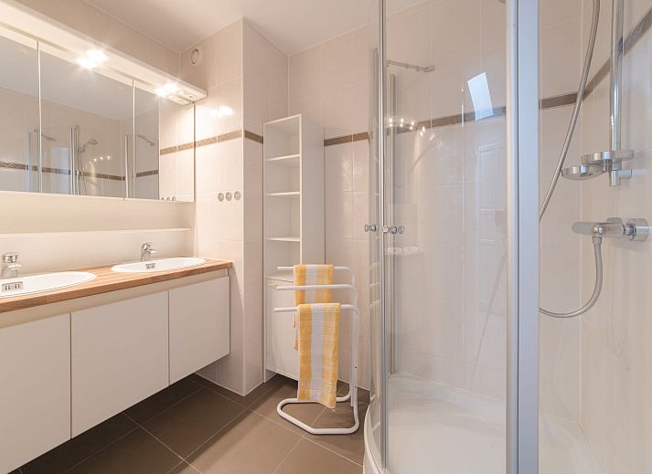 Cozy living room in Apartment Duplex, Bredene, Belgian coast, with modern decor and dining area for a relaxing stay.