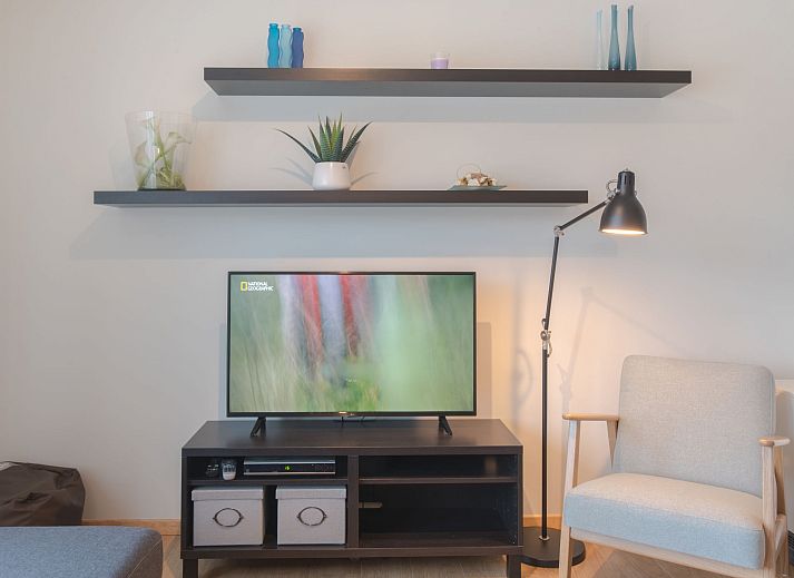 Cozy living room in Apartment Duplex, Bredene, Belgian coast, with modern decor and dining area for a relaxing stay.