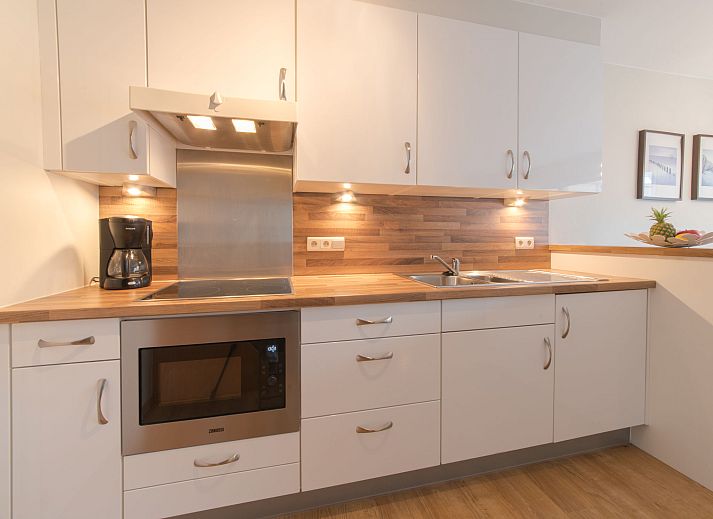 Cozy living room of Apartment Duplex in Bredene, Belgian coast, with modern decor and lots of natural light.