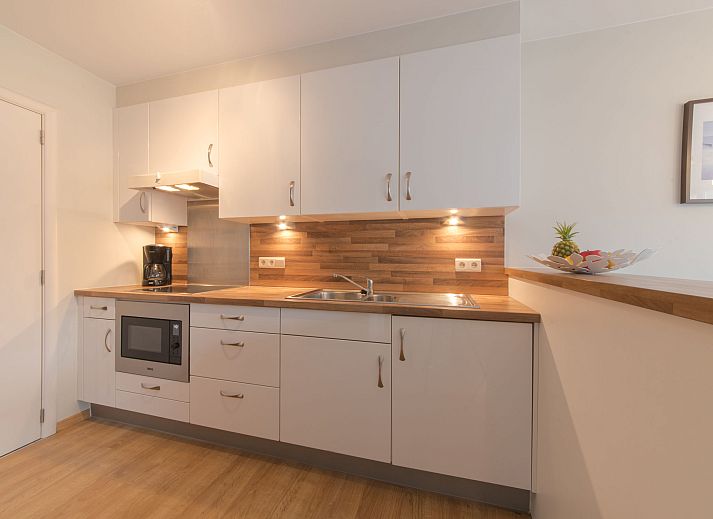 Apartment Duplex in Bredene, Belgian coast, with modern balconies and views of the surroundings.