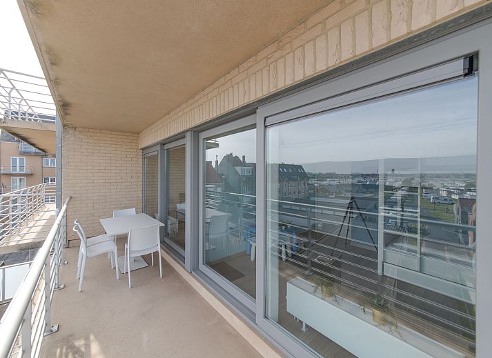 Modern living room in Apartment Solis, Bredene, Belgian coast, with stylish decor and comfortable seating area.