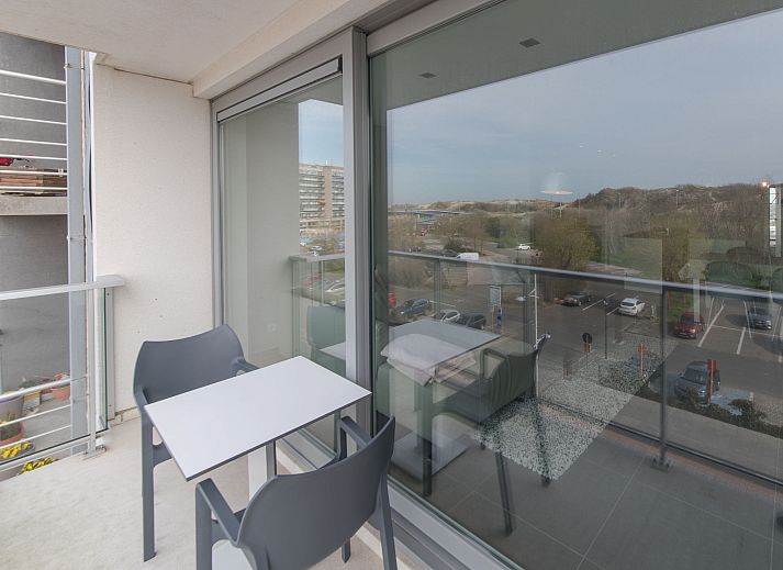Modern living room in Apartment Solis, Bredene, Belgian coast, with stylish decor and comfortable seating area.