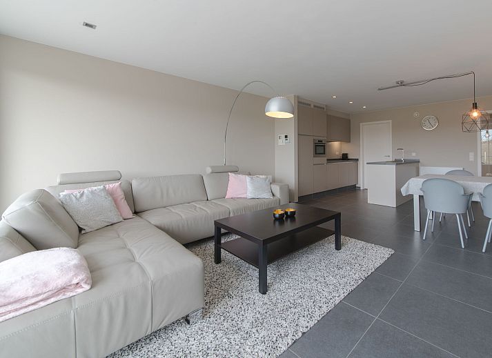 Cozy living room of Apartment Solis in Bredene, Belgian coast, with modern decor and views of nature.