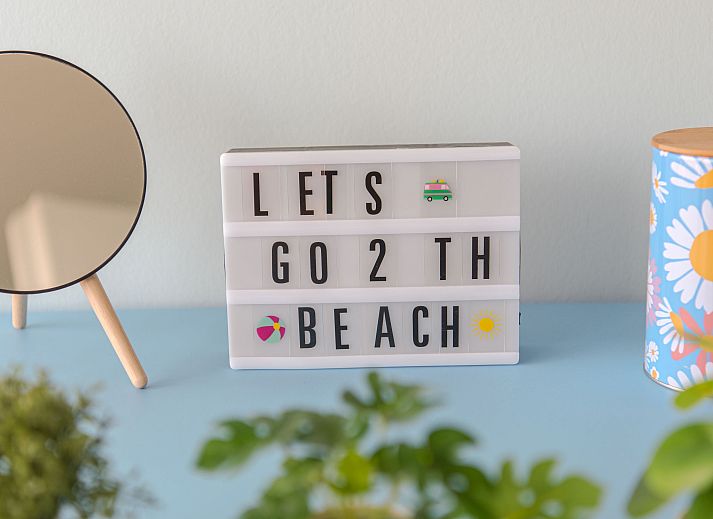 Cozy living room of Apartment Solis in Bredene, Belgian coast, with modern decor and views of nature.