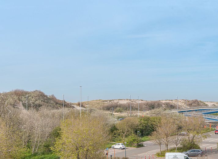 Cozy living room of Apartment Solis in Bredene, Belgian coast, with modern decor and views of nature.