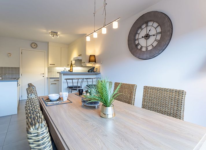 Cozy living room of Apartment Residentie Zandloper in Bredene, Belgian coast, with modern decor and lots of natural light.