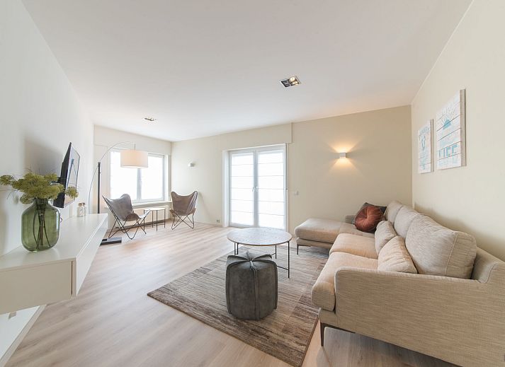 Stylish interior of Apartment Alaska Beach in Bredene, Belgian coast, with spacious living room and dining area for a relaxing stay.