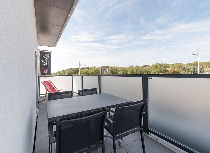 Stylish interior of Apartment Alaska Beach in Bredene, Belgian coast, with spacious living room and dining area for a relaxing stay.