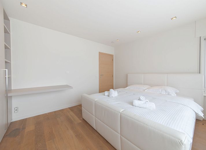 Enjoy the spacious terrace at Apartment Alaska Beach in Bredene, Belgian coast, ideal for relaxation overlooking nature.