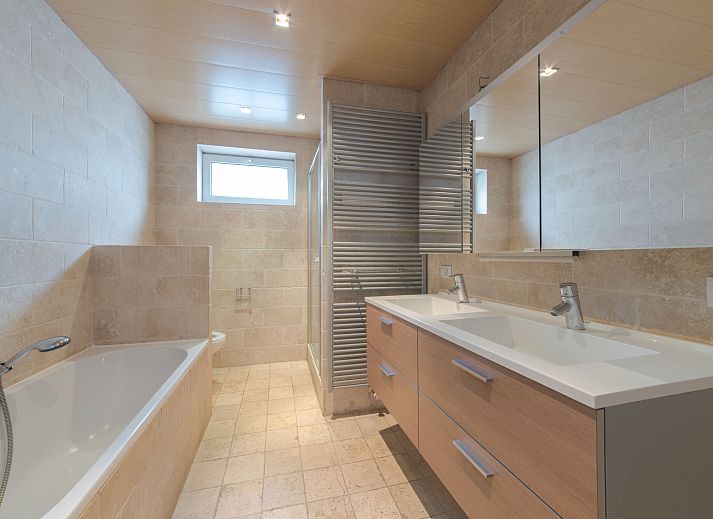 Stylish bedroom in Apartment Alaska Beach in Bredene, Belgian coast, offers comfort and tranquility for a relaxing stay.