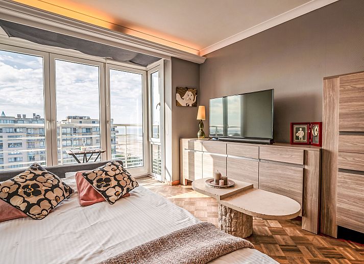 Cozy living room of Apartment Ravenna in Middelkerke, Belgian coast, with a beautiful view and modern decor.