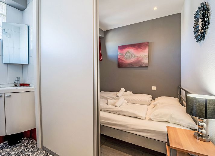 Cozy living room of Apartment Ravenna in Middelkerke, Belgian coast, with a beautiful view and modern decor.
