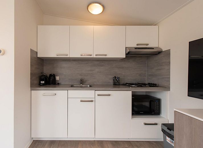 Comfort Lodge in Westende, Belgische kust: gezellige vakantieaccommodatie met veranda, perfect voor hondenliefhebbers, voorzien van airco.