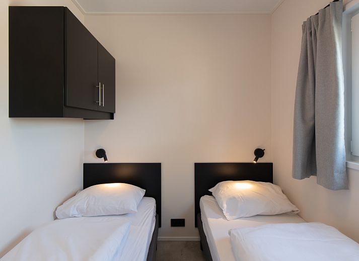 Geniet van een ontspannen verblijf in de Wood Lodge, Nieuwpoort. Comfortabele binnenruimte met airco waar honden welkom zijn.