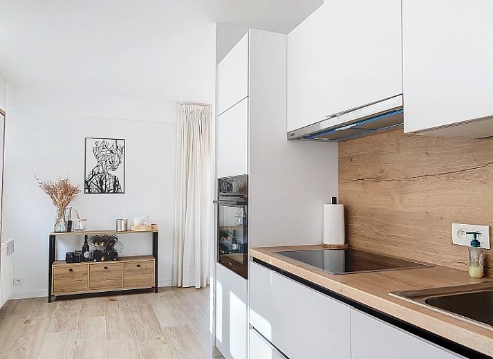 Stylish living room in Tijl Uilenspiegel apartment, Oostduinkerke, Belgian coast.
