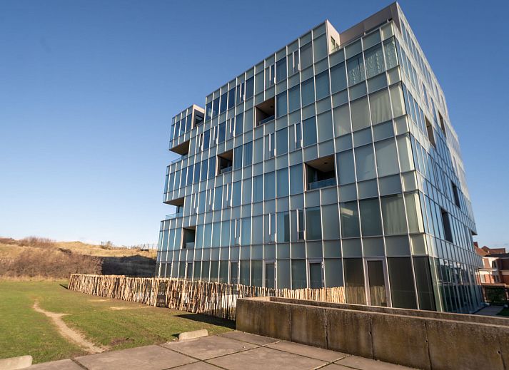 Stijlvolle woonkamer van Appartement Ocean in Oostende, Belgische kust, met modern interieur en ruime zitruimte.