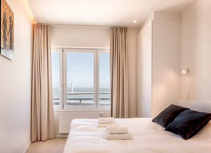 Stijlvolle woonkamer met zeezicht in Logeren met zeezicht, Oostende, Belgische kust appartement.