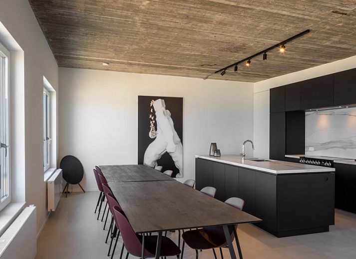 Slaapkamer met uitzicht op de Noordzee in Logeren met zeezicht, Oostende, Belgische kust appartement.