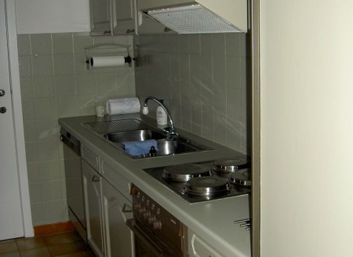 Cozy living room with sea view at 't Lange Lis apartment in De Panne, Belgian coast.