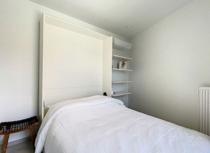 Bright living space in Apartment 'Asterias', De Panne, with a cozy sitting area.