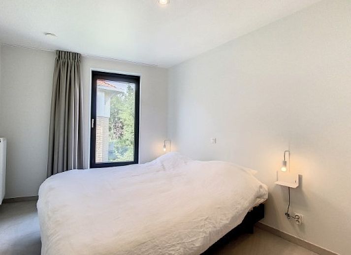 Bright living space in Apartment 'Asterias', De Panne, with a cozy sitting area.