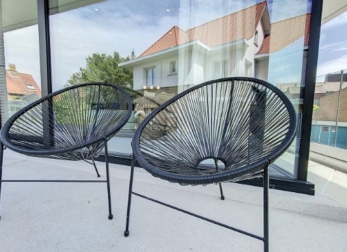 Open kitchen in Apartment 'Asterias', De Panne, with modern appliances and dining area.