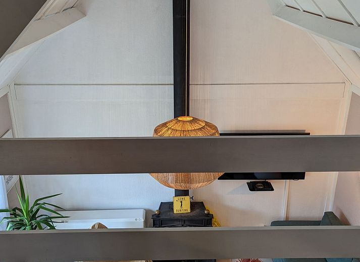 Eingang zum Ferienhaus Duinendaele II in De Panne, belgische Kueste, mit moderner Einrichtung und Zugang zu den Schlafzimmern.