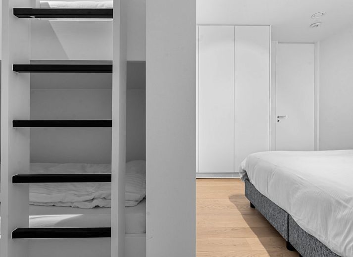 Modern kitchen in Penthouse 'Ter Elst', a luxury apartment in De Panne on the Belgian coast with a view of the city.