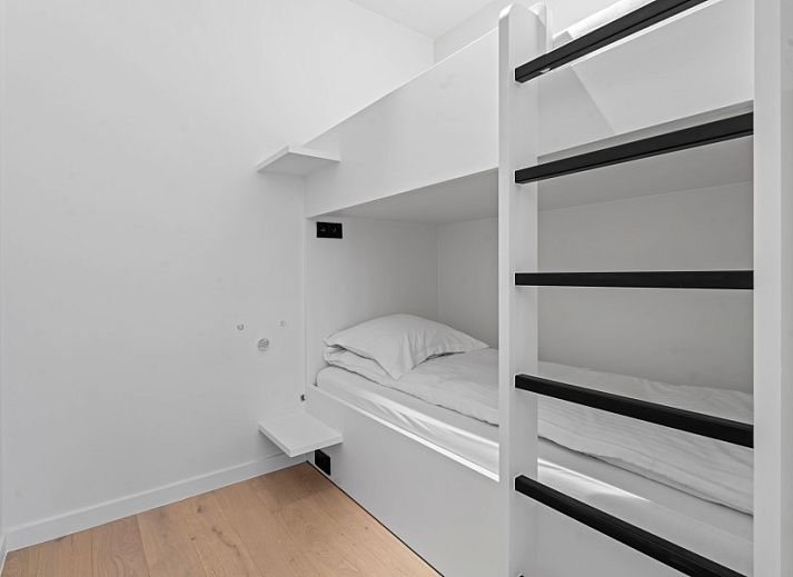 Modern kitchen in Penthouse 'Ter Elst', a luxury apartment in De Panne on the Belgian coast with a view of the city.