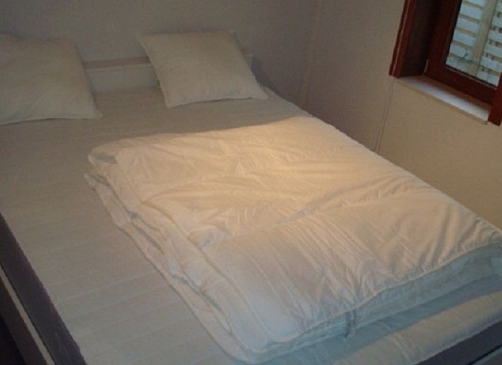 Gemuetliches Esszimmer im Vissershuisje59, Ferienhaus in Wenduine, belgische Kueste mit moderner Kueche.