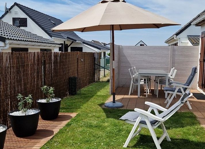 Vissershuisje 89 in Wenduine, rustieke vakantieaccommodatie met ruime tuin aan de Belgische kust.