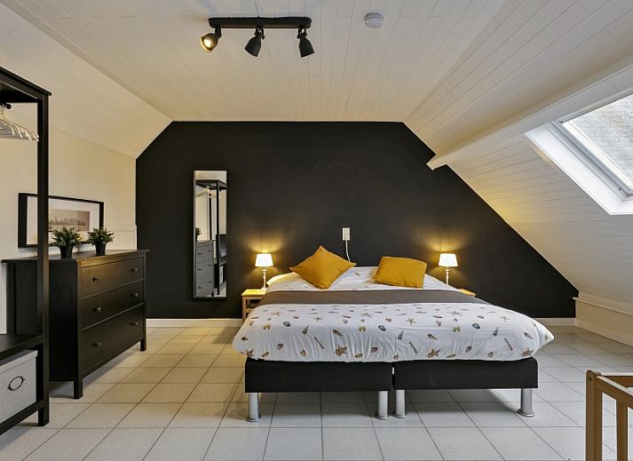 Street scene near Maison Lambic apartment in De Panne, Belgian coast, with charming local stores.