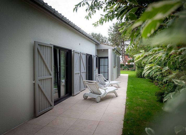 Breakfast on the terrace of B & B YACA in De Haan, Belgian coast, with fresh rolls and cheese.