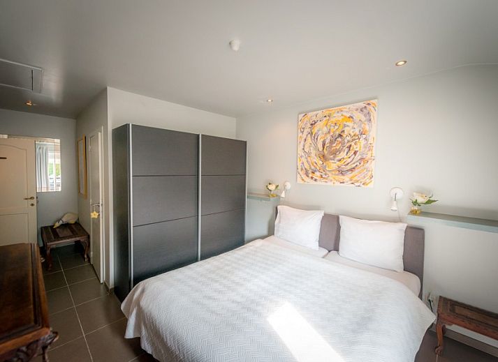 Breakfast on the terrace of B & B YACA in De Haan, Belgian coast, with fresh rolls and cheese.