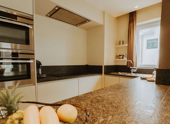 Stylish living room in Apartment Goethe close to the beach in De Haan, Belgian coast. Comfortable accommodation with modern furnishings.