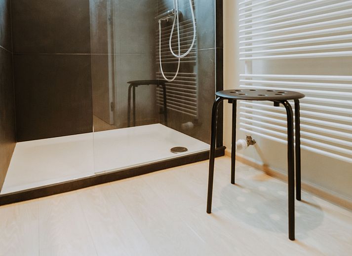 Stylish living room in Apartment Goethe close to the beach in De Haan, Belgian coast. Comfortable accommodation with modern furnishings.