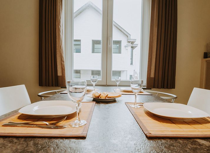 Stylish dining space in Apartment Goethe, De Haan, Belgian coast. Enjoy a modern indoor space close to the beach.