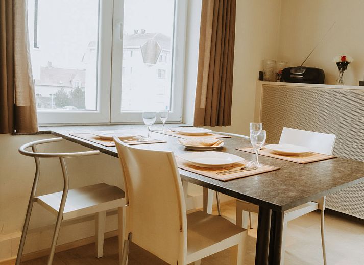 Modern kitchen in Apartment Goethe, close to the beach in De Haan, Belgian coast, with stylish decor and lots of natural light.