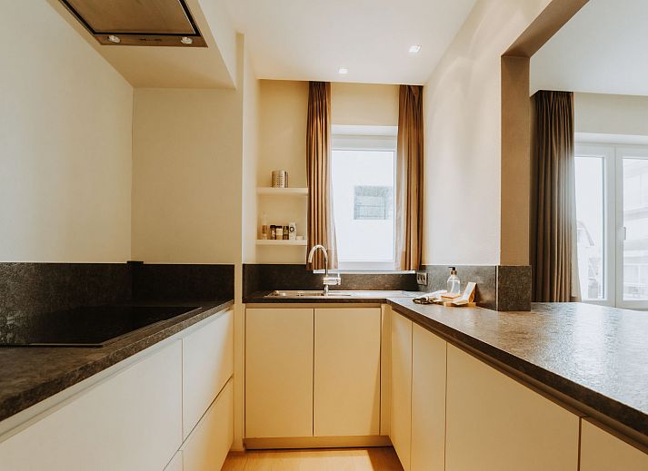 Attractive bedroom in Apartment Goethe, De Haan, Belgian coast, with comfortable bed and natural light for optimal relaxation.