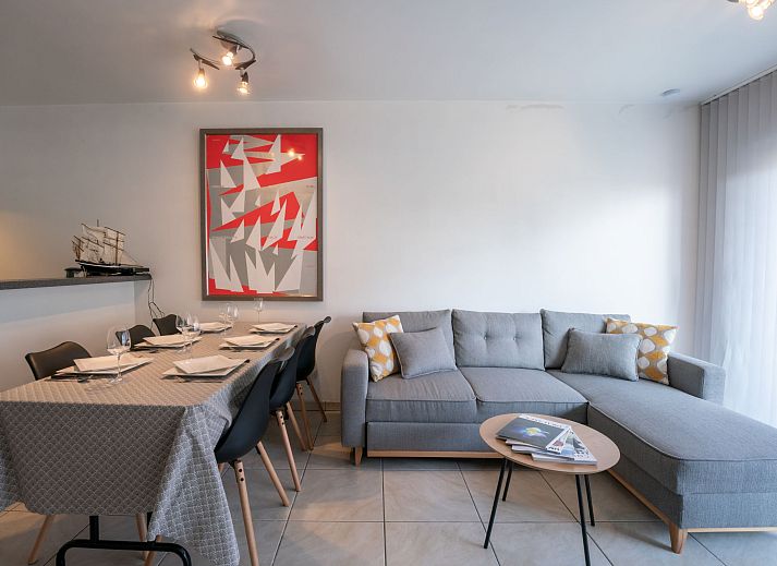 Geniet van het uitzicht vanaf het balkon van Appartement Green Garden in De Haan, Belgische kust, ideaal voor een ontspannen vakantie.