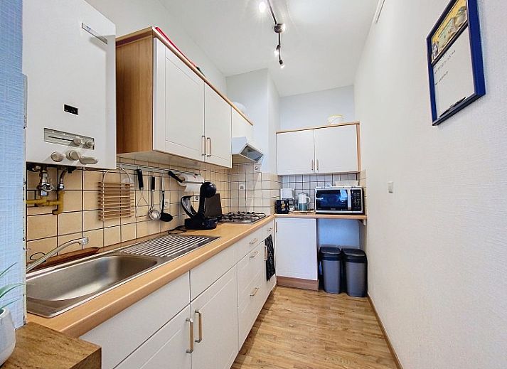 Ruime woonkamer met eethoek in Louvain Plage appartement, Koksijde-bad, Belgische kust.