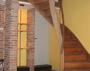 Wooden staircase in Frances Milton vacation home, Bruges, West Flanders.