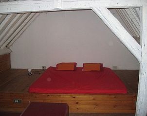 Spacious attic room in Frances Milton vacation rental, Bruges, Belgium.