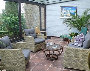 Lichte serre met planten in Den Anker vakantiehuis in Houthulst, West-Vlaanderen.