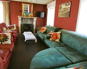 Landelijke omgeving van Hof ter Harte vakantiehuis, Ieper, West-Vlaanderen met rustieke charme en plattelandsuitzicht.