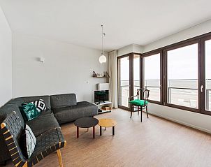 Bright living room in De Meeuwen third vacation home with sea view in Koksijde, West Flanders, Belgium.